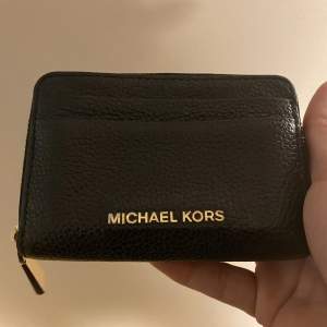 Plånbok fr Michael Kors.  Fint skick