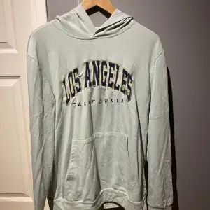 Tunn hoodie med Los Angeles tryck