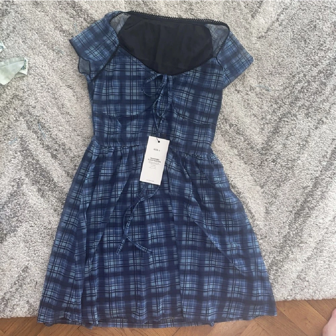Blå rutig klänning - 91