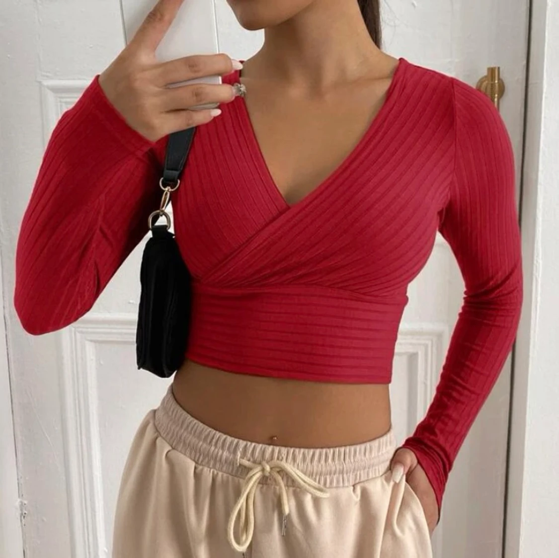 Urringad ribbstickad tröja 