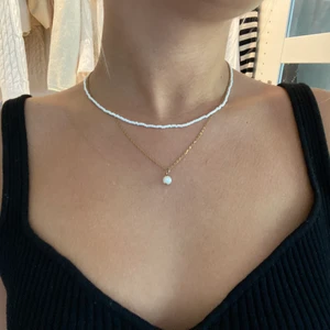 Halsband - Säljer det via halsbandet, alltså inte det med en pärla! Använt ett fåtal gånger