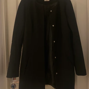 X  - Super snygg kappa perfekt till vintern! 
