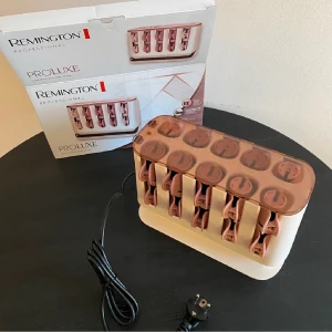 Remington Hårrullar - Testade en gång, så nästintill i helt nyskick. Inköpta för 599:- 