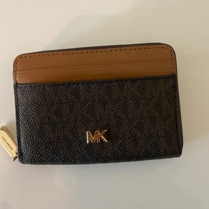 Plånbok  - Äkta Michael kors plånbok använd få gånger 