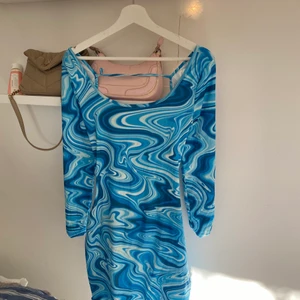 Melerad klänning - Använd 1 gång 