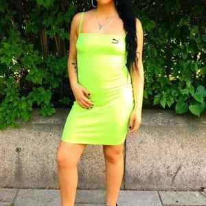 Puma klänning grön/gul - Utsåld Puma klänning i storlek M. 