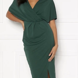 Klänning  - ~ aldrig använd, prislapp kvar ~ stretchigt material 