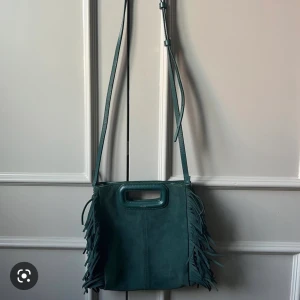 maje väska - !!intressekoll!!  Jag glr nu en intressekoll på min mörkgröna maje väska. Den säljs inte längre och den är inprincip i nyskick!! Skkriv privat om ni är intresserade eller undrar något!!💓💓skulle eventuellt kunna byta