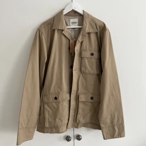 Dobber jacka (L) - Oanvänd dobber jacka.  Storlek L Nypris 1000kr, lapp finns kvar.