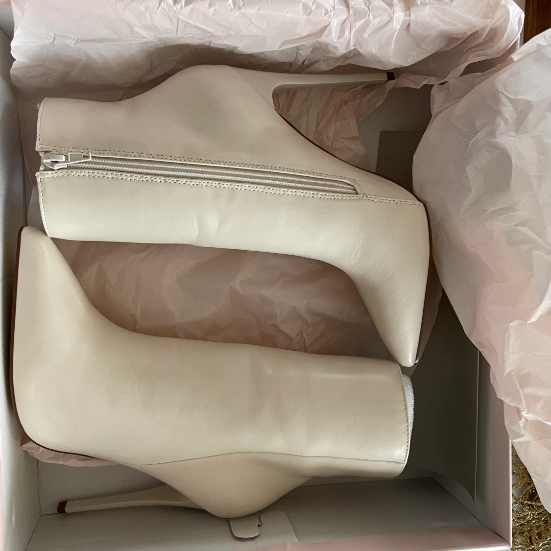 Högklackade stövlar