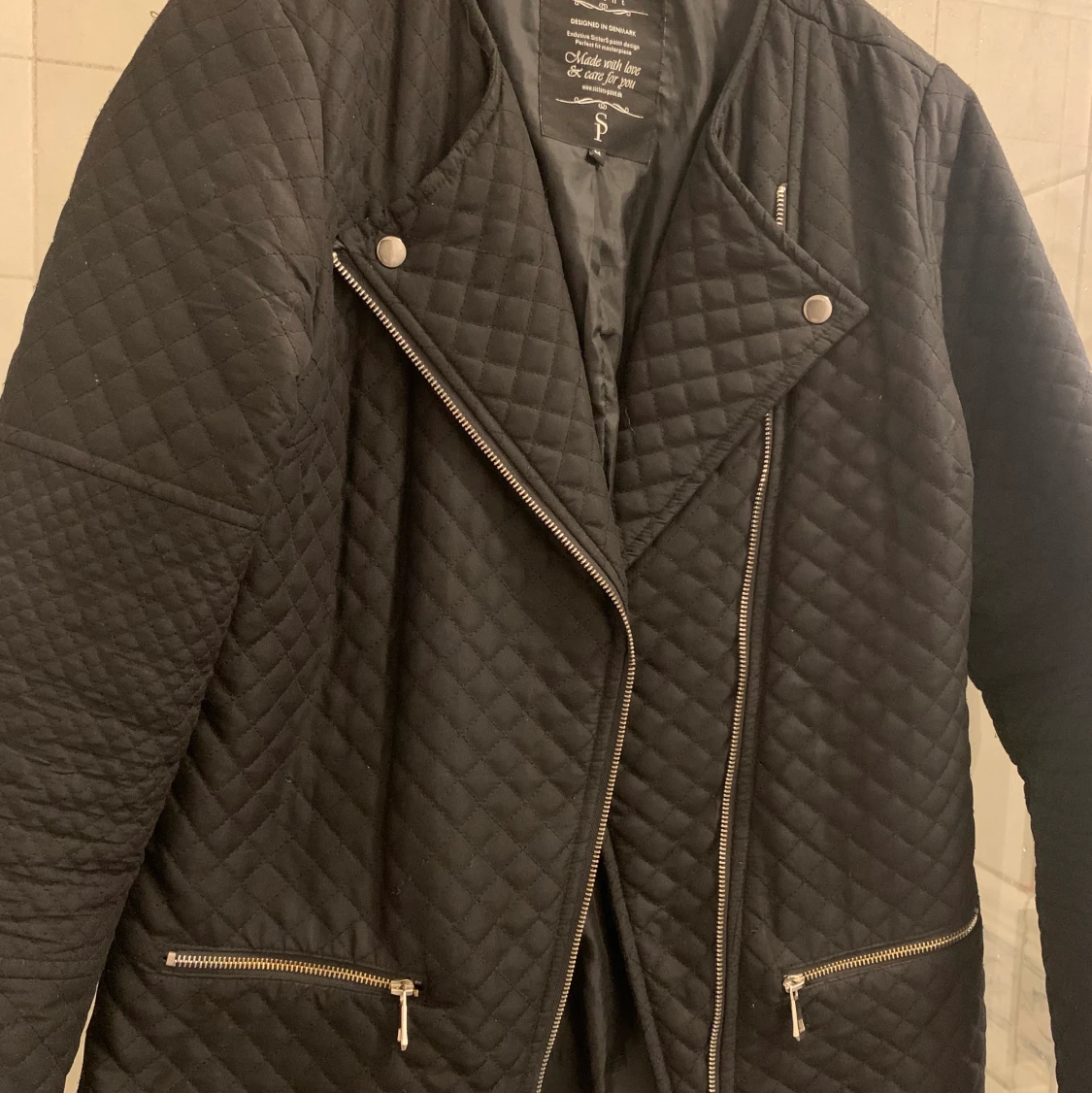 Jacka från sitter point storlek M