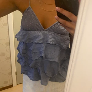 Volangtopp  - En blå söt volangtopp, kommer tyvärr ej till användning längre 