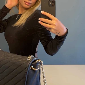 Body  - En body aldrig använt endast testat. Öppen i rygg. Köparen står för frakten.