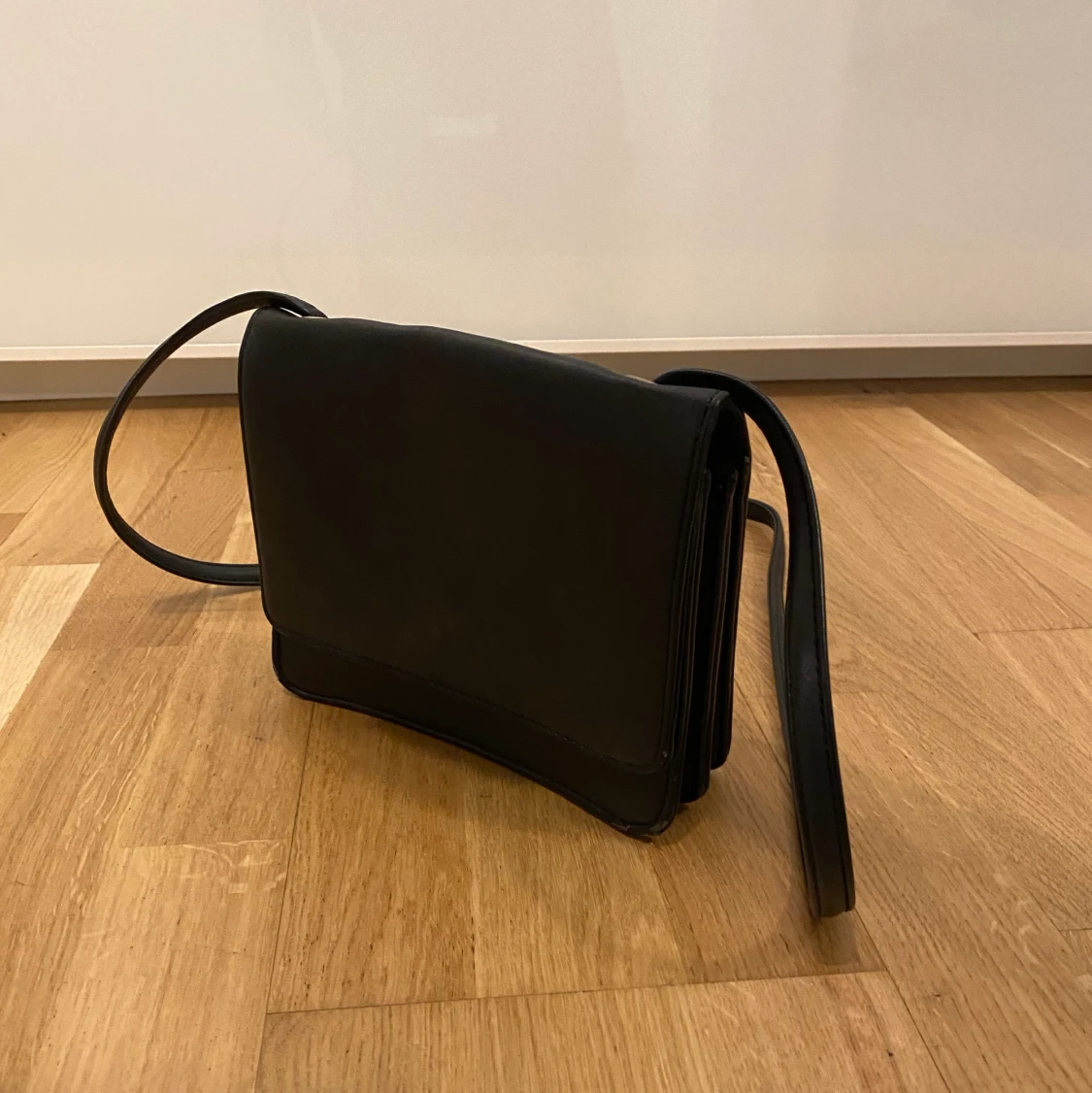 Svart väska. - 91
