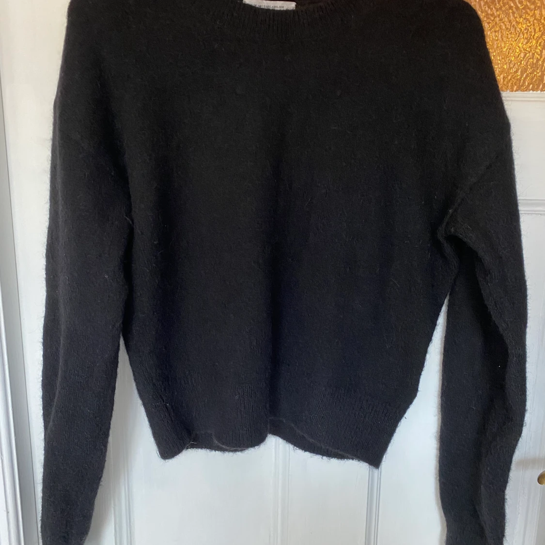 Svart stickad tröja från other stories 