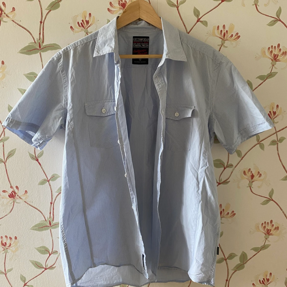 ljusblå skjorta - 90