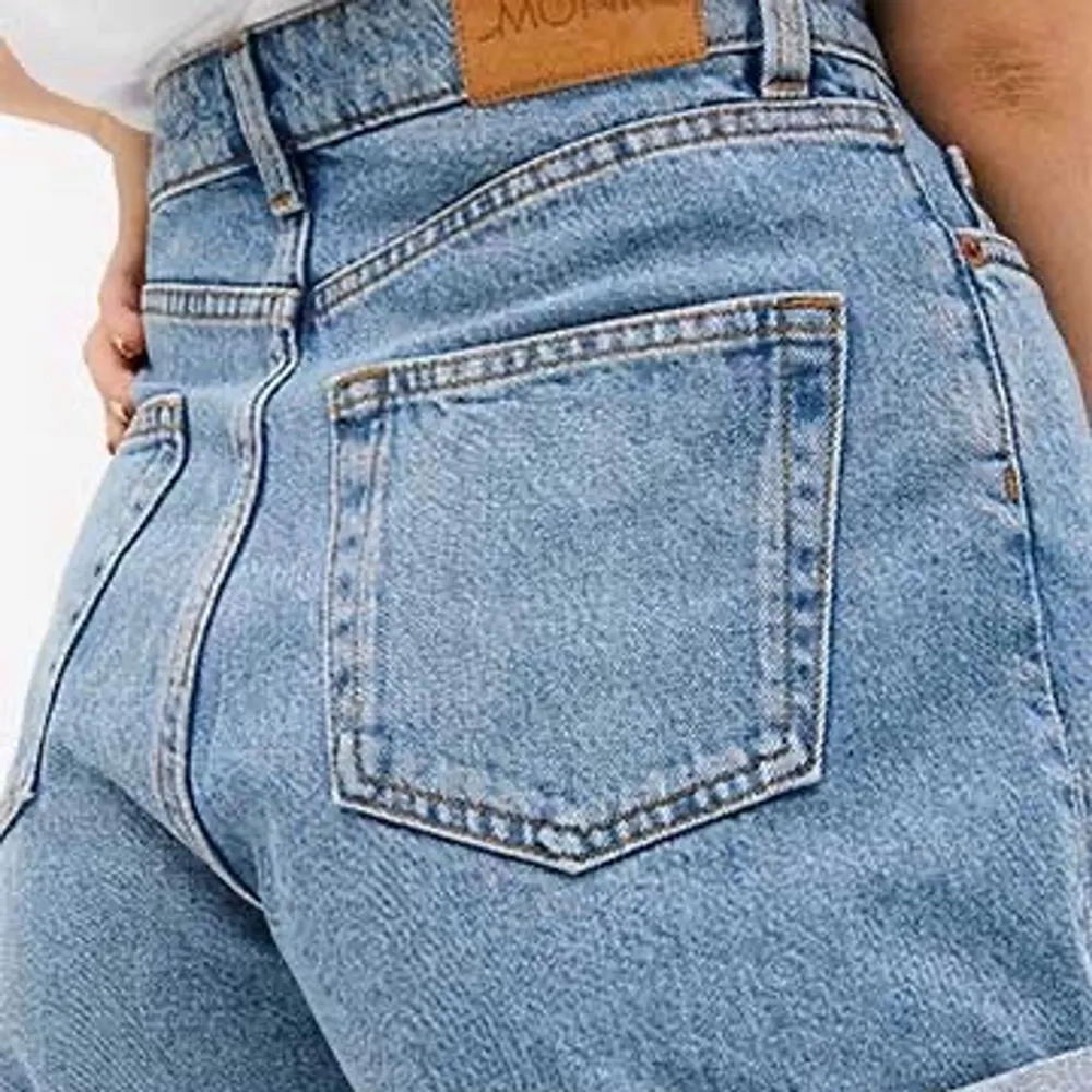 monki light jean shorts with strong demin. slight adjustment have been made: extra button on waistband so that you can close them tighter, and darts on the back of the legs so they dont flair out. size 38 but also fits 36!. Shorts.