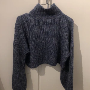 Tröja  - En flerfärgad stickad tröja från Ginatricot