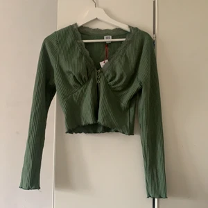 Snygg topp från Urban outfitters storlek M  - Nytt skick, stolek M. 