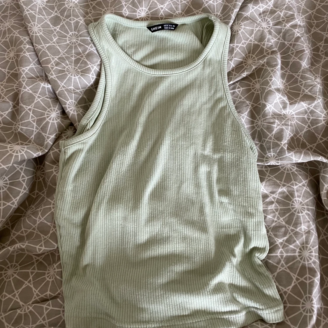 Ett mintgrönt linne  - 91