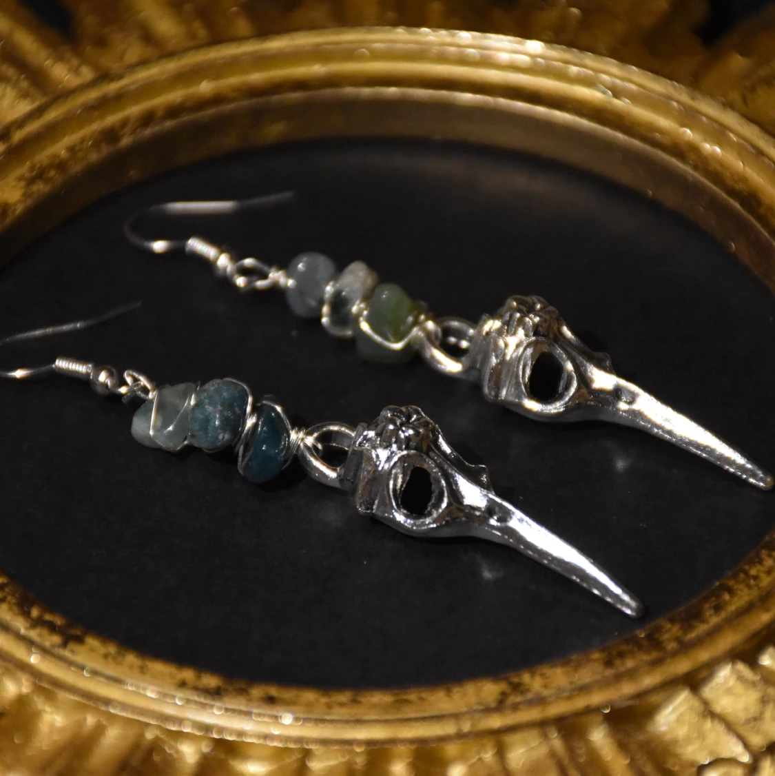 Örhängen fågelskalle  - 90