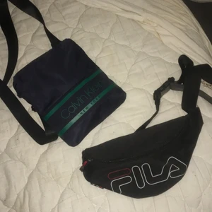 Calvin Klein/ fila väska  - Calvin Klein köpt nyligen nypris låg på 550  i väldigt bra skick, fila väskan i väldigt bra skick med säljs för 100 har jag haft ett tag så säljer billigare