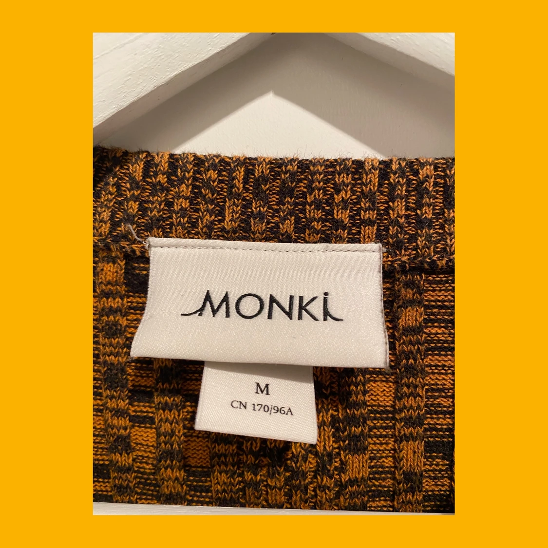 Brunmelerad tröja - 91