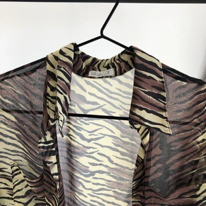 Animal Print blouse - Light and a bit see through, excellent condition:)