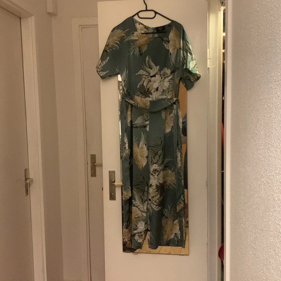 Jumpsuit blommönster strl 10