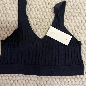 Filippa K yoga top. Never worn with tag  - If you’re not in Stockholm I can send it and add shipping costs. 