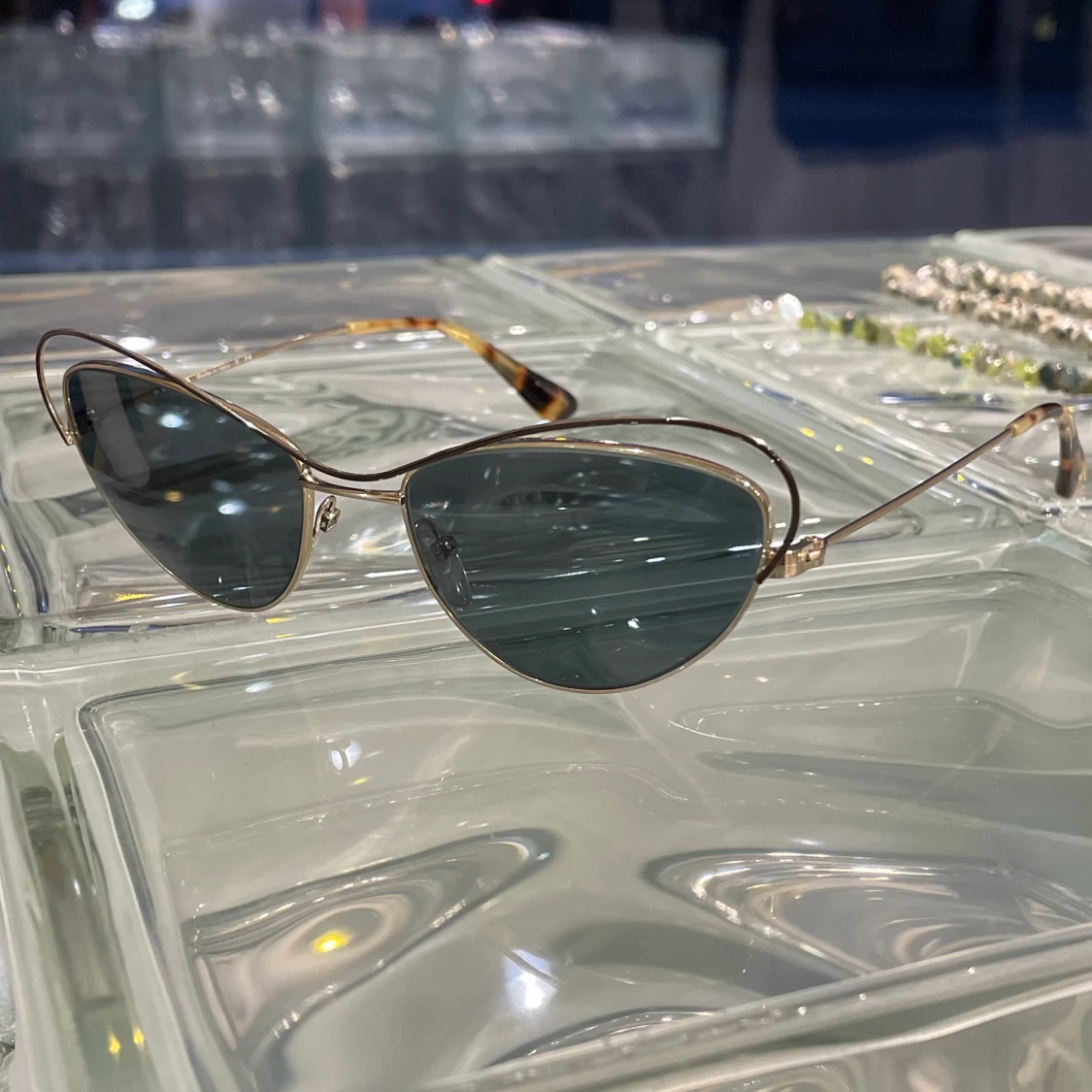 ‘Prada’ sunglasses - 90