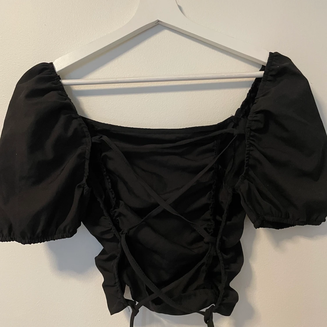 Topp med öppen rygg