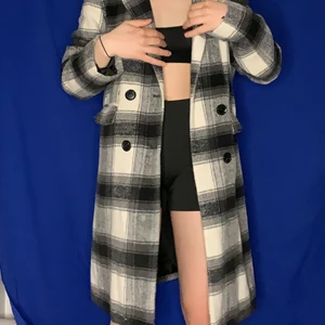 coat - black and white coat. selling for 200, it is in perfect condition. I do not know from where it is, got it from. a friend but i am size xs/s and this is how it fits for reference!!🥰 perfect for summer nights as it is light but warm enough!