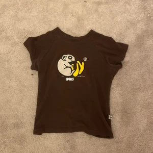 Baby tee  - Jätte snygg baby tee i brun färg. Så fin till sommaren!