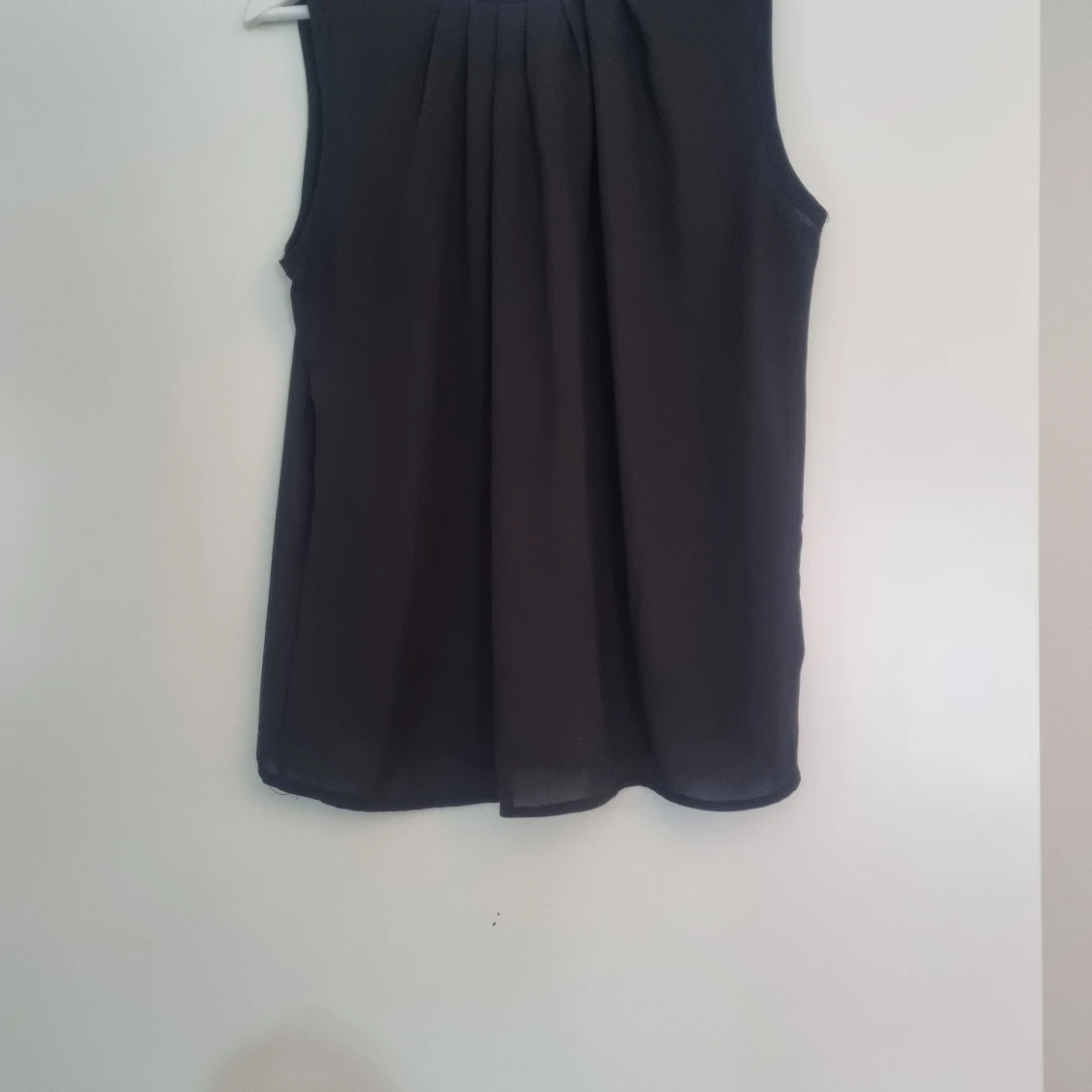 Svart blus storlek L