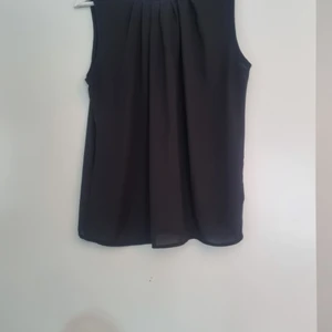 Svart blus storlek L - Oanvänd Svart blus