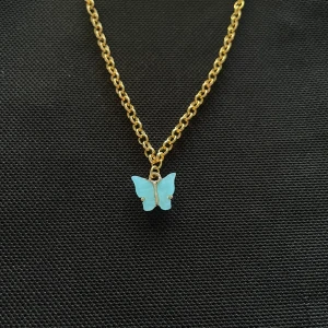 🦋himmelsblå fjäril halsband🦋 - 🦋frakt 15kr🦋