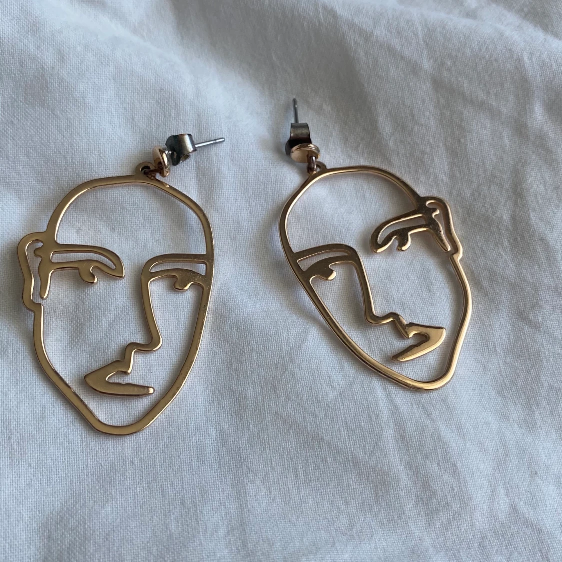 Ansikte örhängen - 91