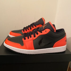 Air Jordan 1 low - Jordan 1 low black turf orange-white. Storlek 44. Helt nya och oanvända .