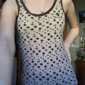 Gulligt linne - Gulligt linne i bersch och brunt, med gulligt mönster 