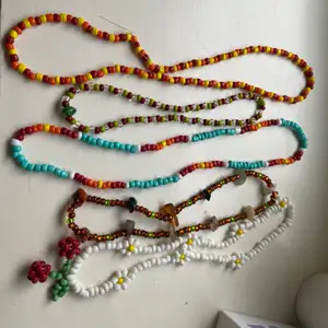 Fun beaded bracelets & necklaces! Necklace is 35kr a piece: bracelets are 25kr a piece. You can choose the design: flower necklace, patterns of colored, length :) have fun with it 