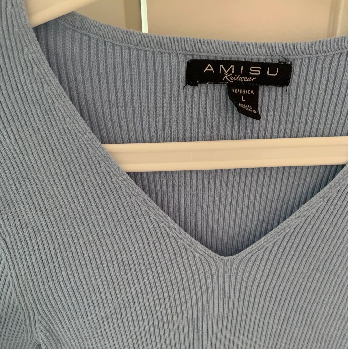 Ljusblå ribbad tröja  - 91