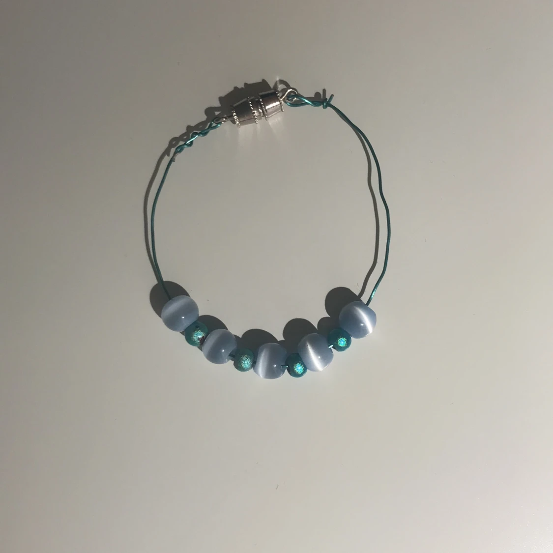 Blått hemgjort armband