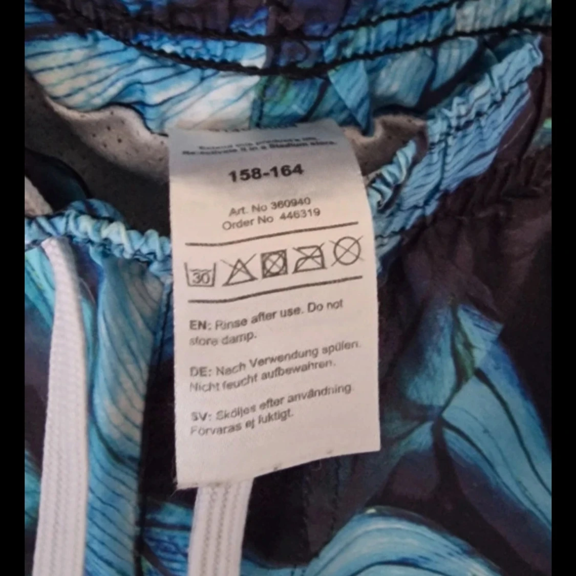 Blå mönstrade badshorts med snörning - 2