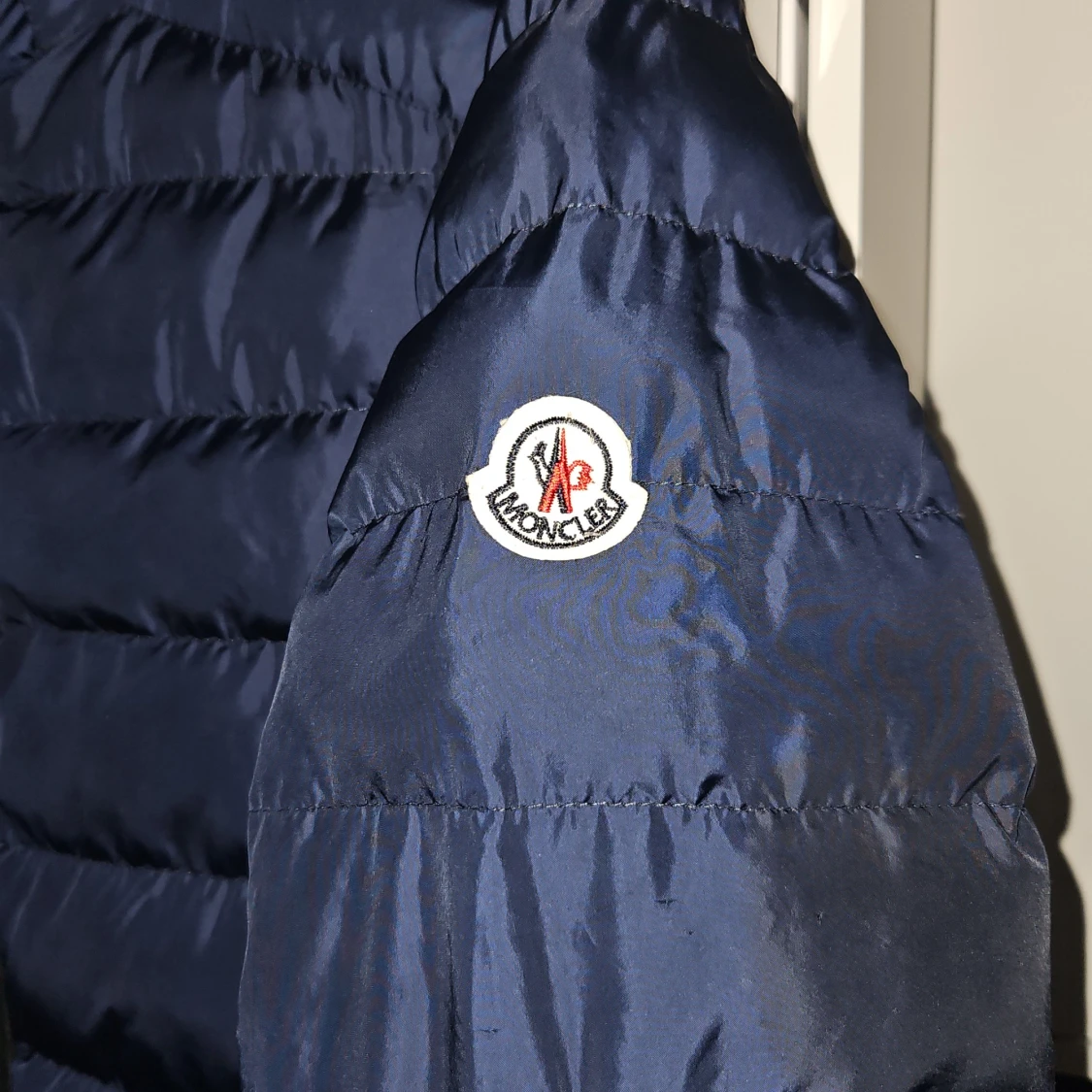 Mörkblå pufferjacka - 1