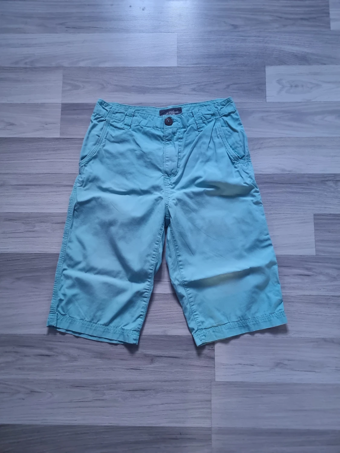 Turkosa shorts från H&M L.O.G.G. strl 164