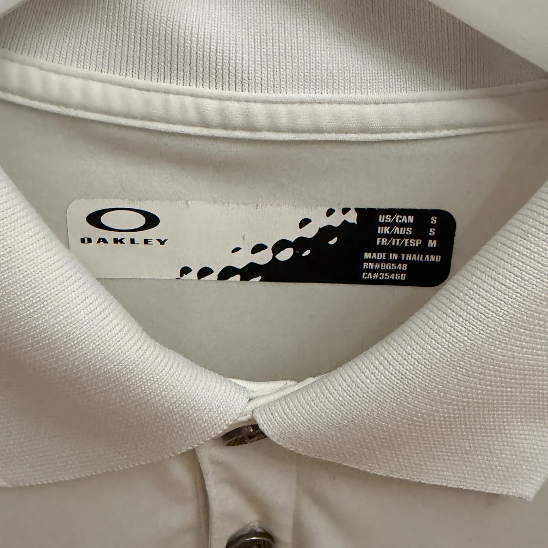 Vit sportig pikétröja från Oakley - 1