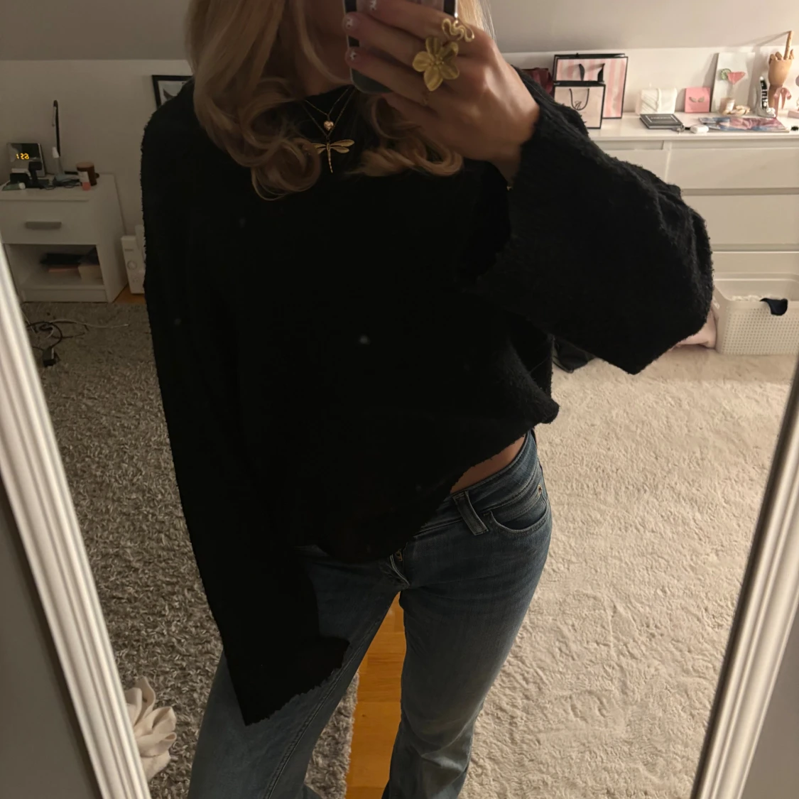 Svart stickad tröja