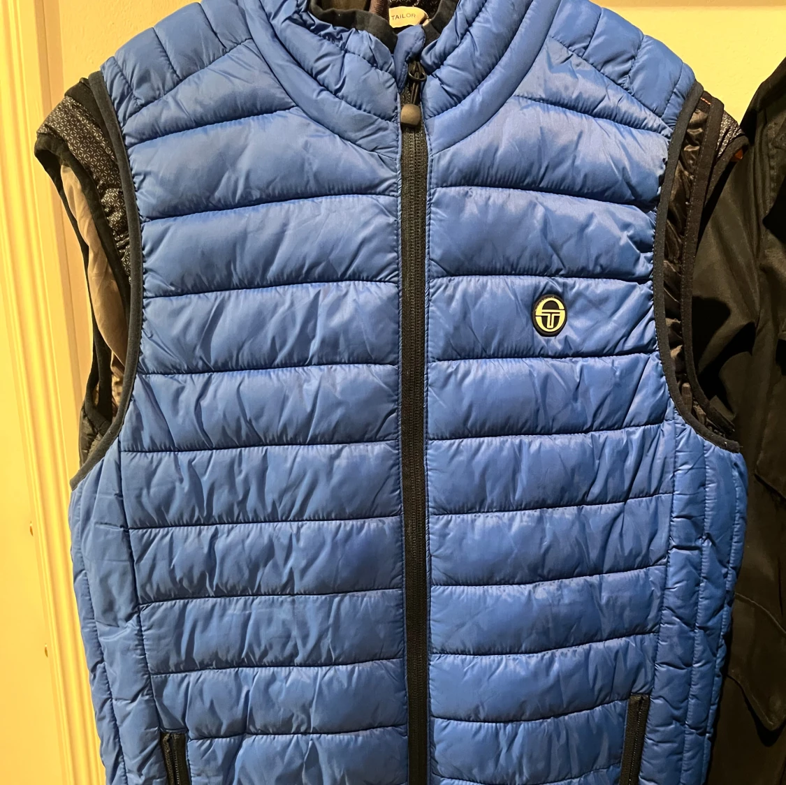 Blå dunväst från Sergio Tacchini