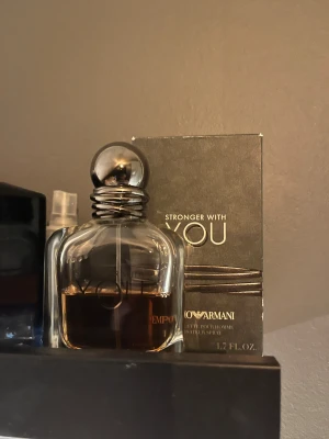 Emporio Armani Stronger With You - Säljer min Emporio Armani stronger with you org. 50ml och ungefär 25ml kvar. En bra vinter parfym. 